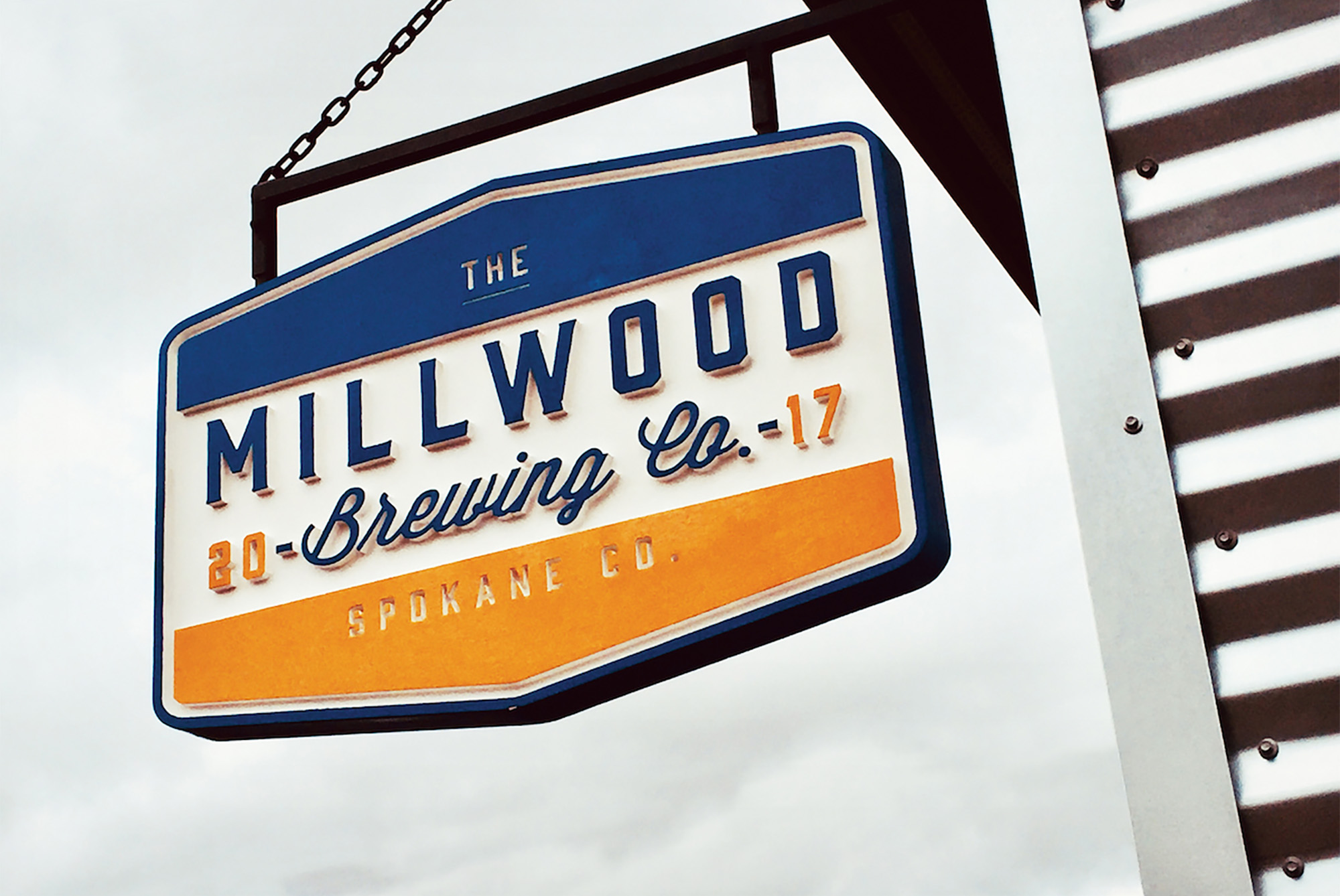 Millwood Washington based Millwood Brewing Company brand shield logo signage.