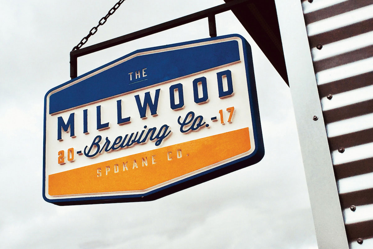 Millwood Brewing Company exterior, trucker logo hanging sign